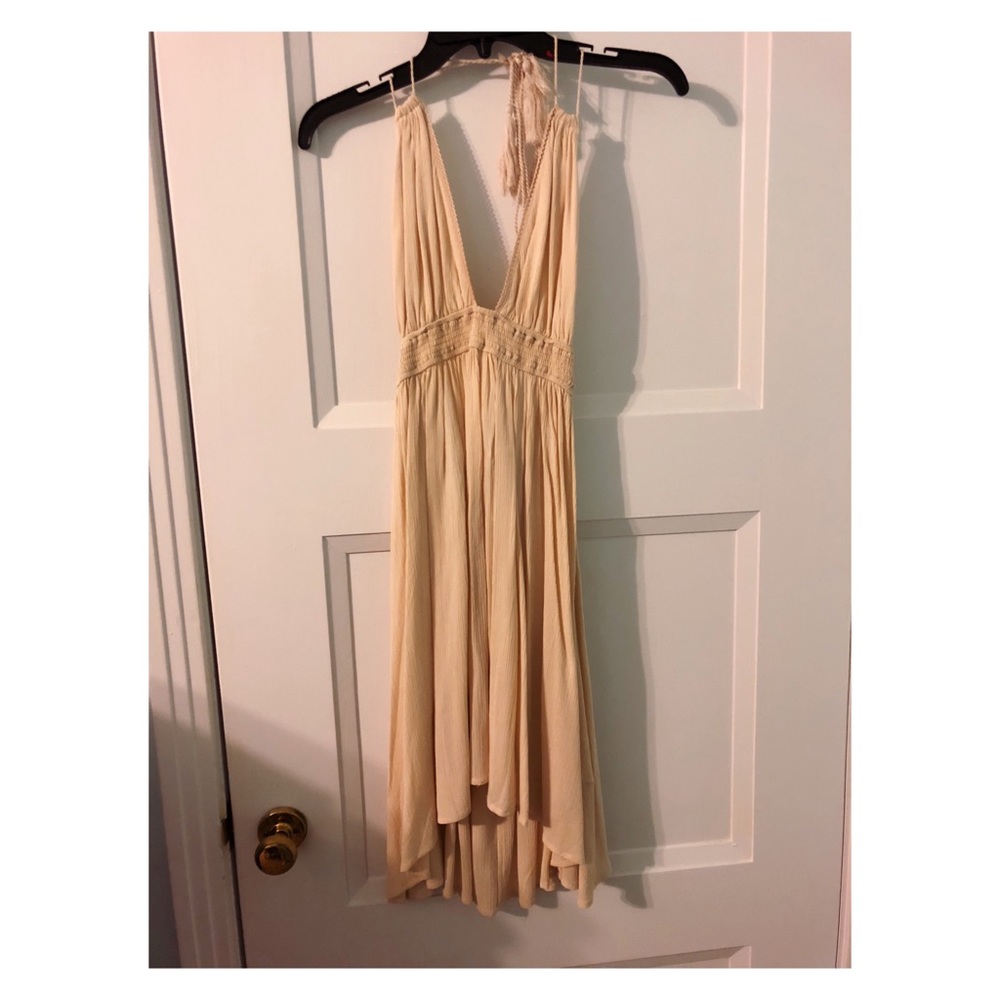 Cream V neck and open back dress